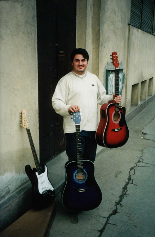 holding guitars