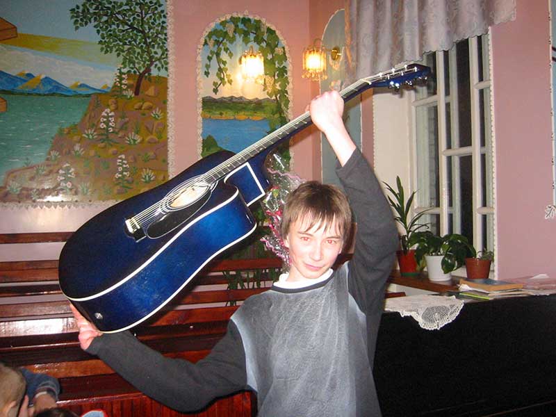 young man with a guitar